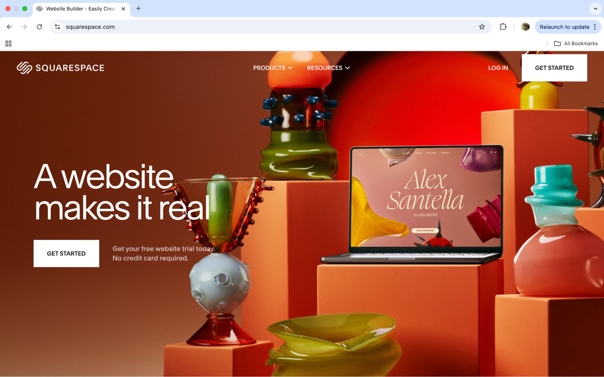 an orange website featuring orange blocks holding homeware and a laptop