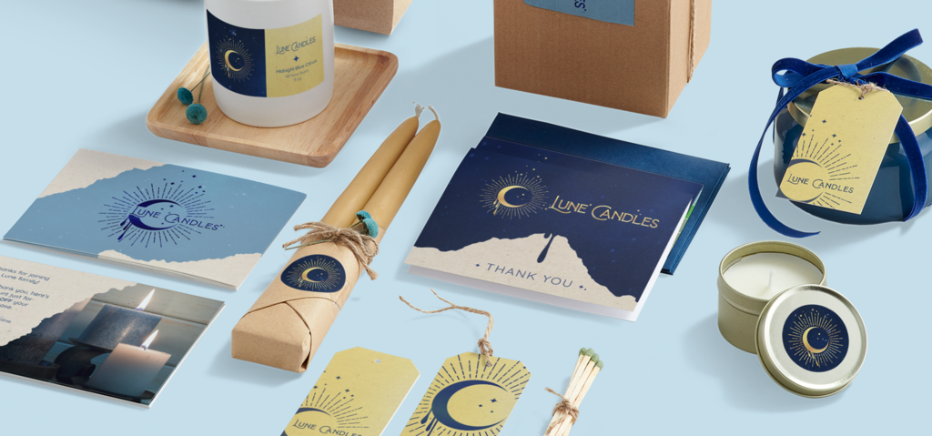 Branded candle packaging with candles, thank-you cards and hang tags