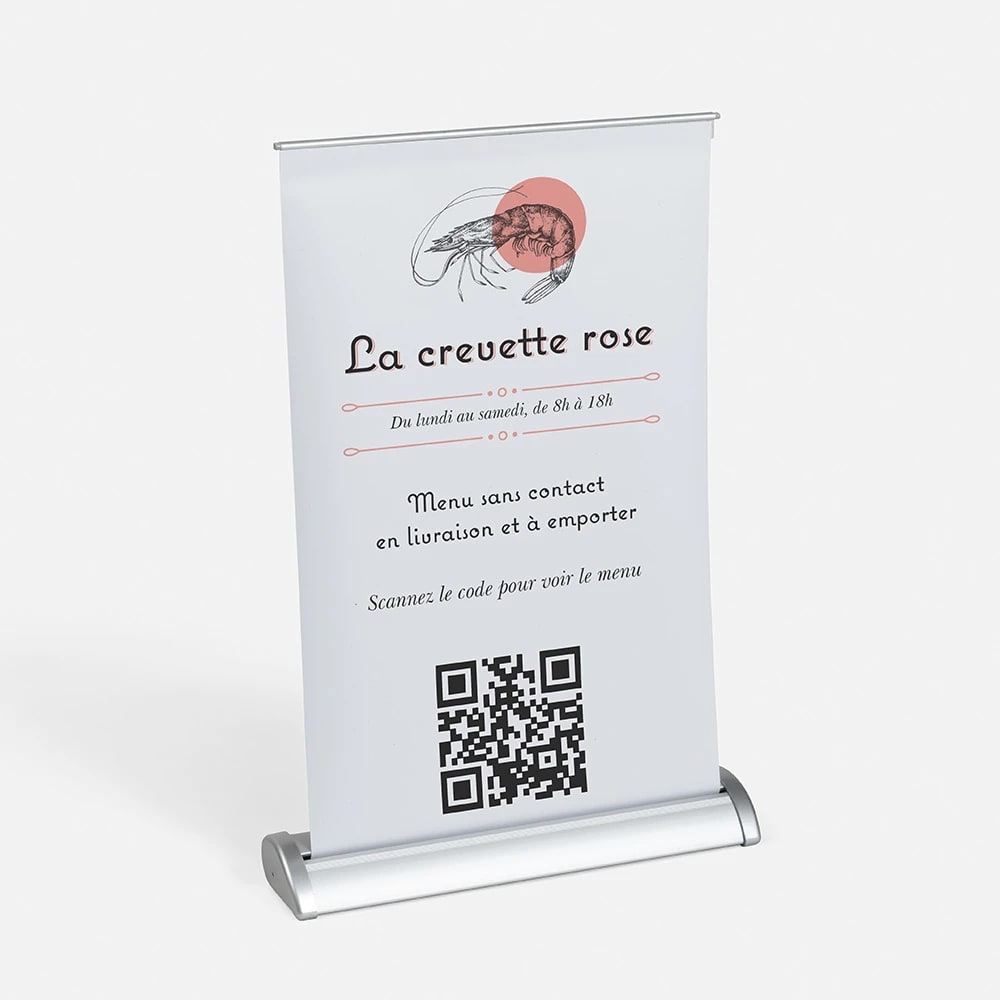 Une plaque de table avec un code QR pour accéder au menu