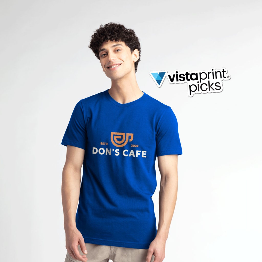 A man in a blue Bella+Canvas T-shirt with a custom logo