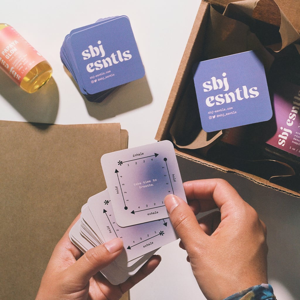 Purple branded round corner wellness business cards with consistent branding