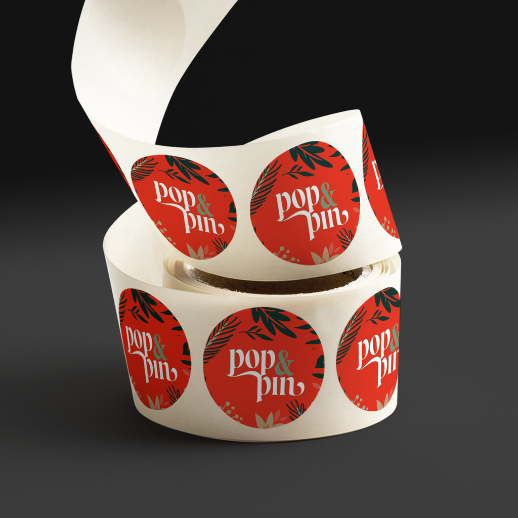 A label roll of branded stickers for packaging