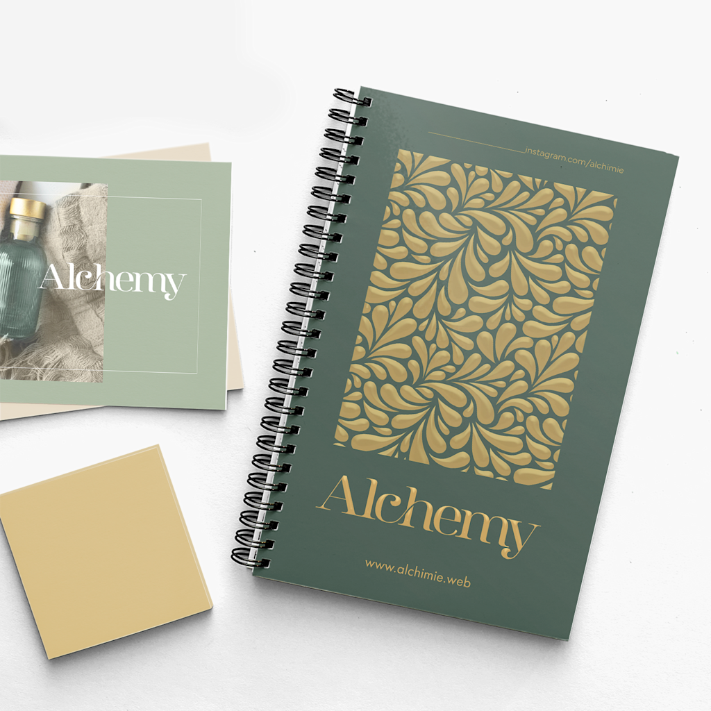 Customized promotional products: a notebook with a gold and green design on a white desk