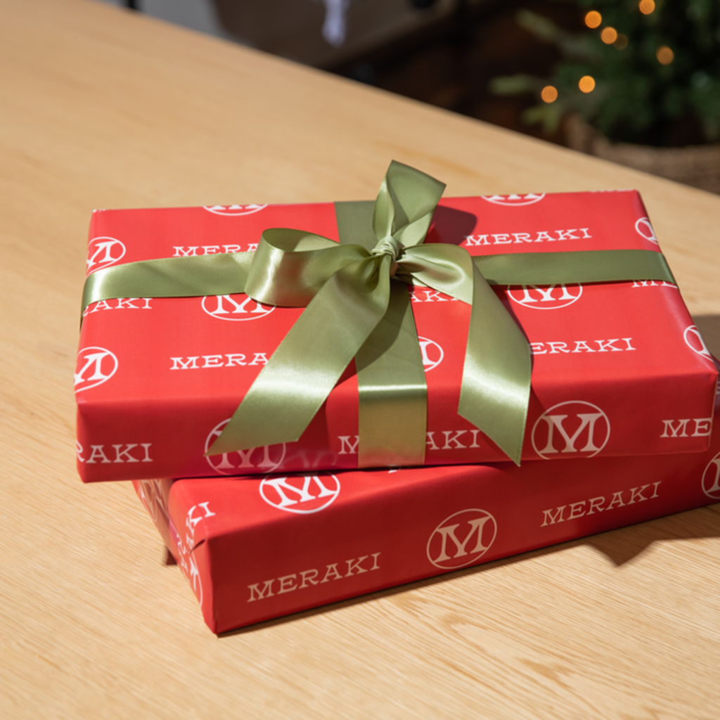 Branded holiday packaging with ribbon