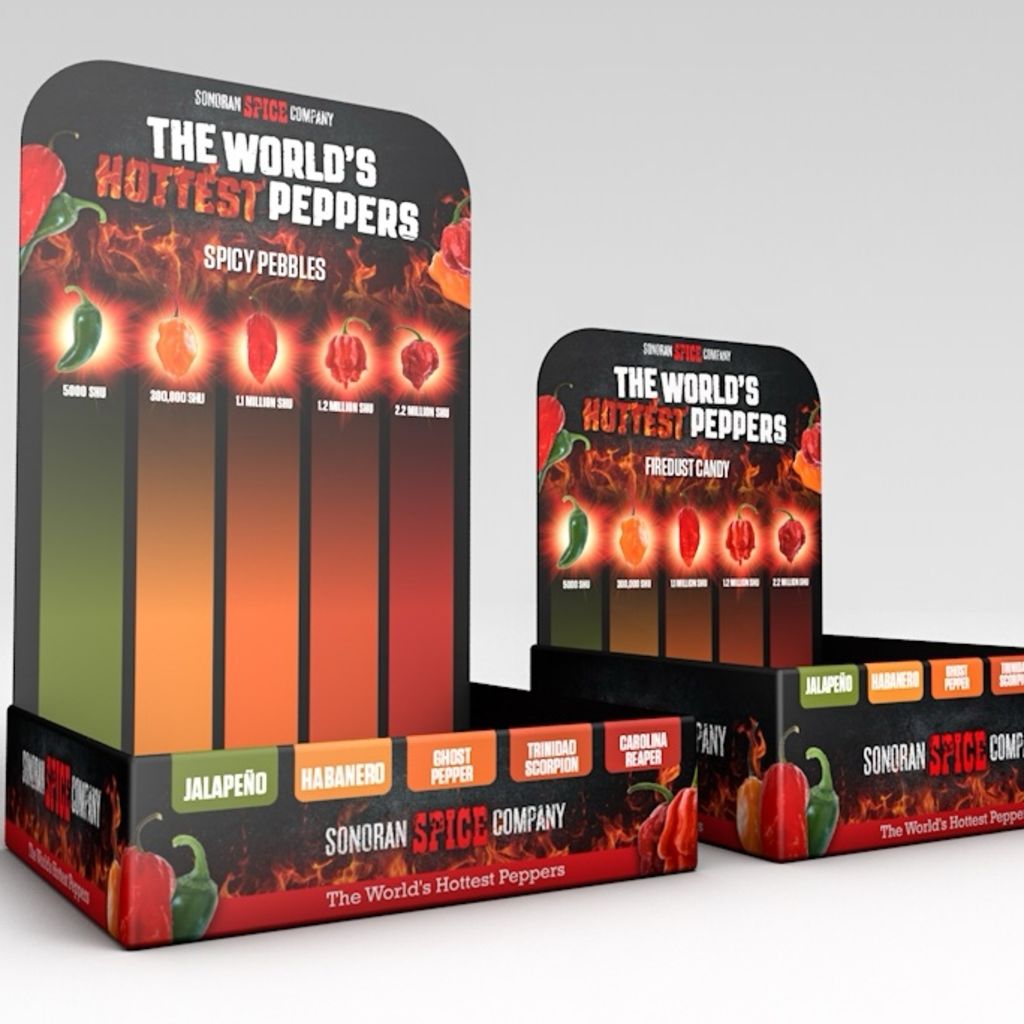 Retail-ready countertop display packaging for spicy pepper products featuring bold pepper-themed branding.