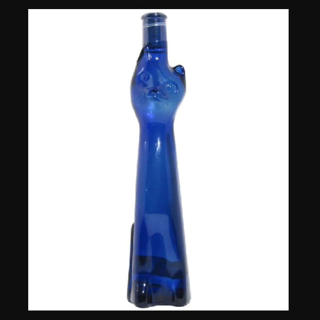 blue wine bottle shaped like a cat