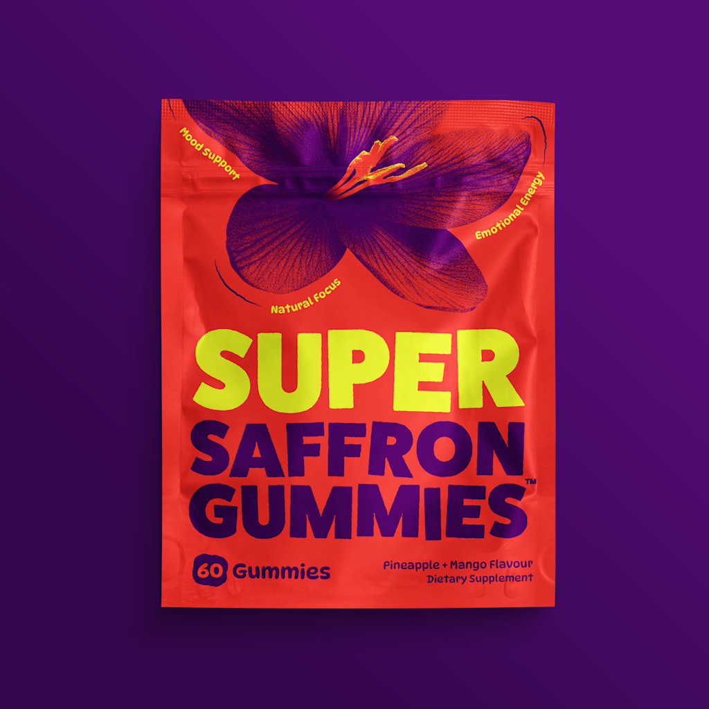 Thermal Glow color trend 2026 example, red packaging with a purple flower and yellow and purple “Super Saffron Gummies” text