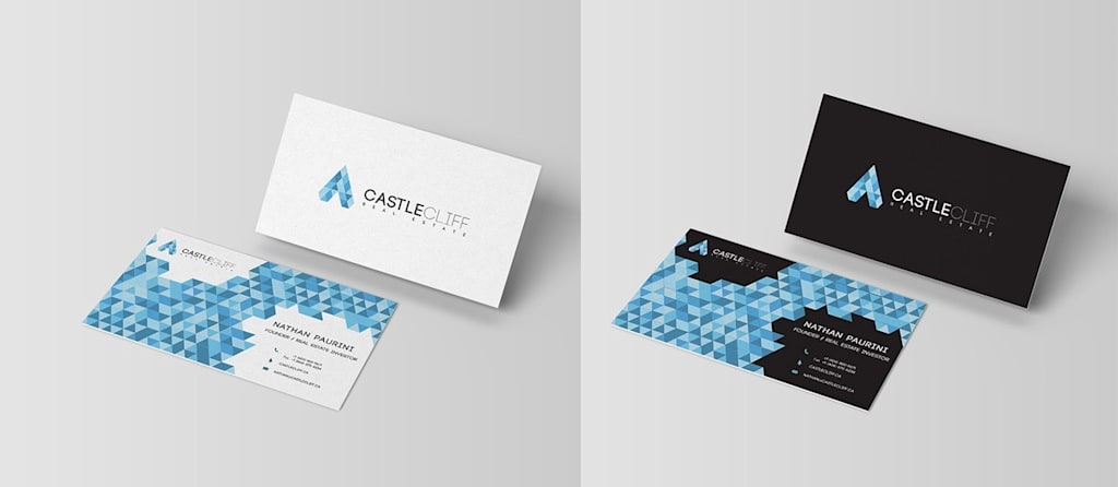 Real estate business card with blue abstract polygon shapes