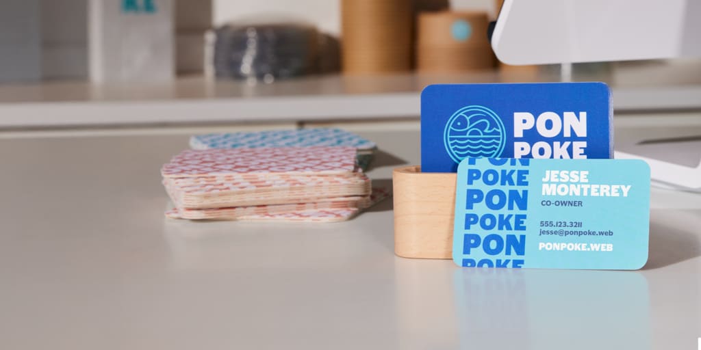 Poke shop business cards printed on both sides with bold font