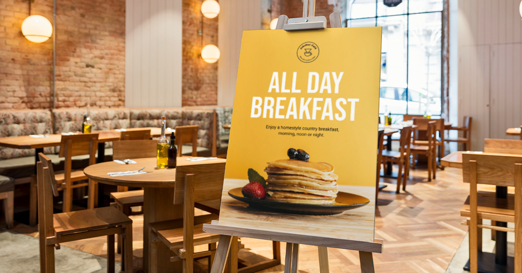 Signage with clear typography announcing &ldquo;All Day Breakfast&rdquo;