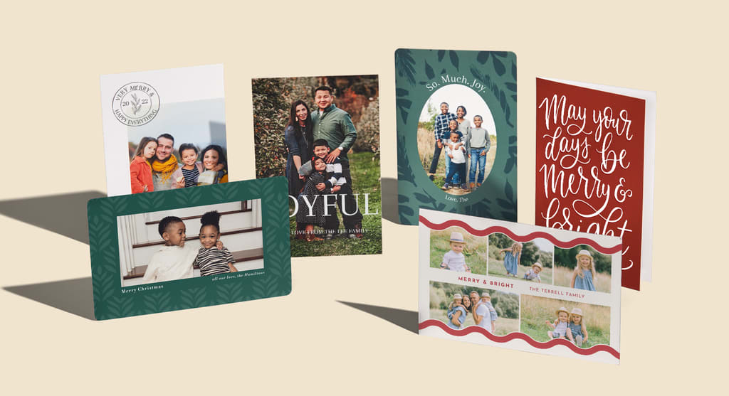 A selection of festive holiday postcards and greeting cards with various symbols and colors to accommodate your celebration