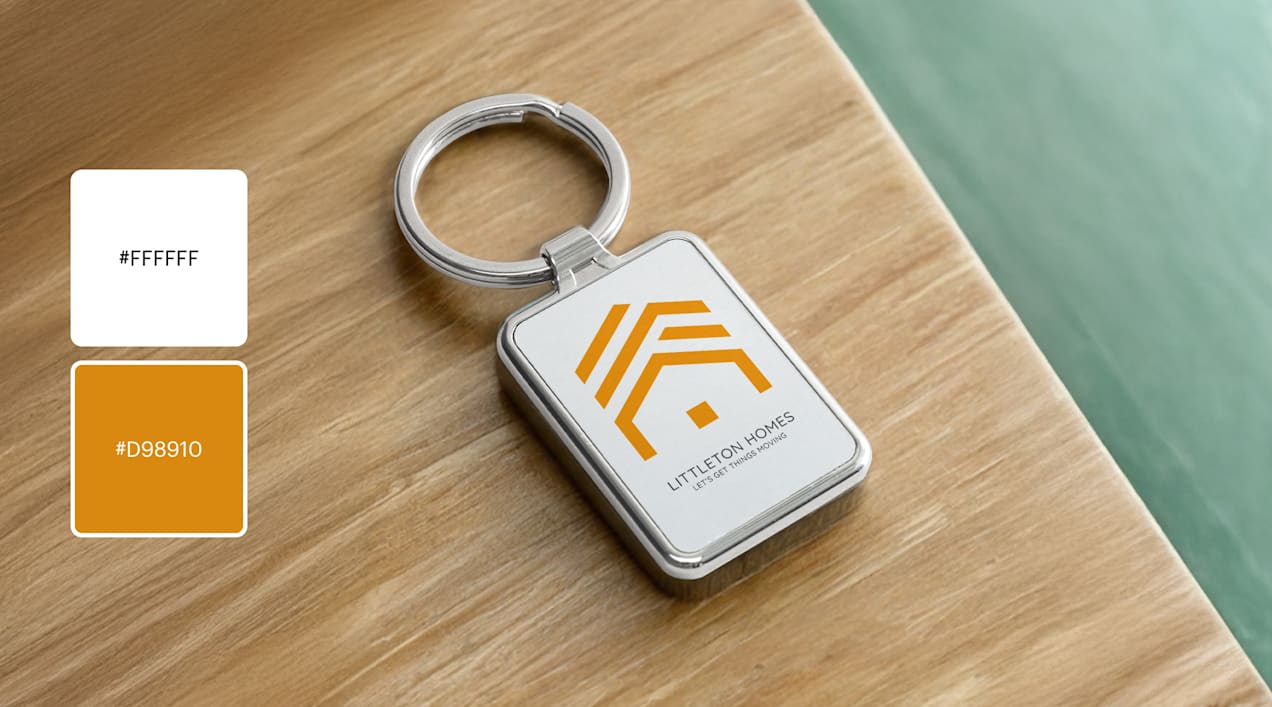 An orange and white logo with a geometric house-shaped design for real estate company