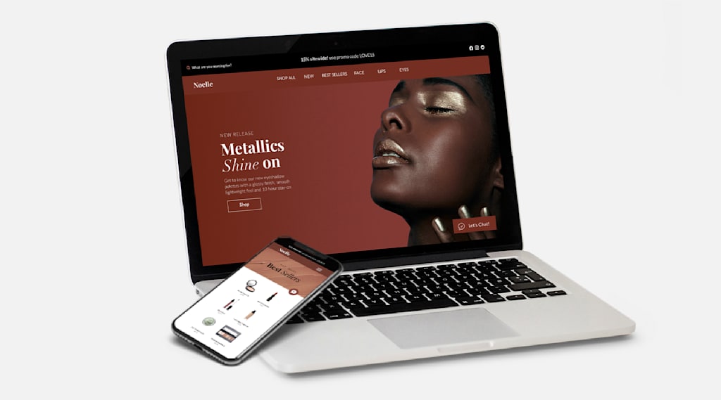 A laptop and phone with a website on the screen