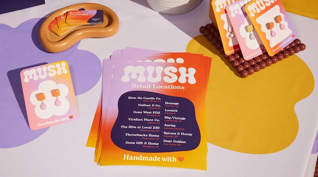 Colorful branded leaflets and flyers on market stall table