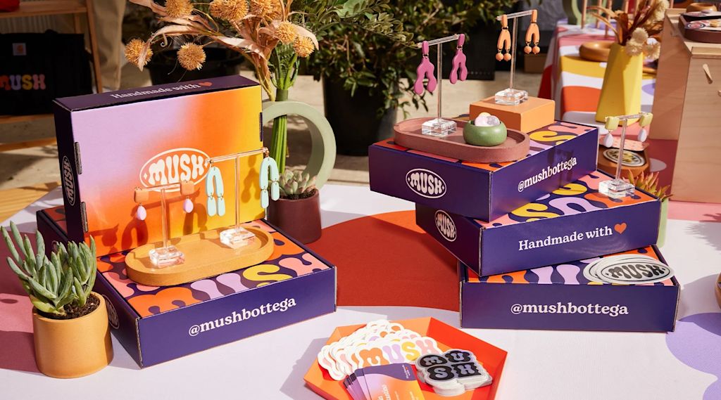 Tips for using outdoor event signs before and at events 3 Colourful branded product display on market stall table