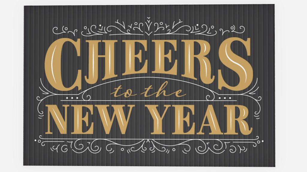 A dark New Year card with bold gold lettering.