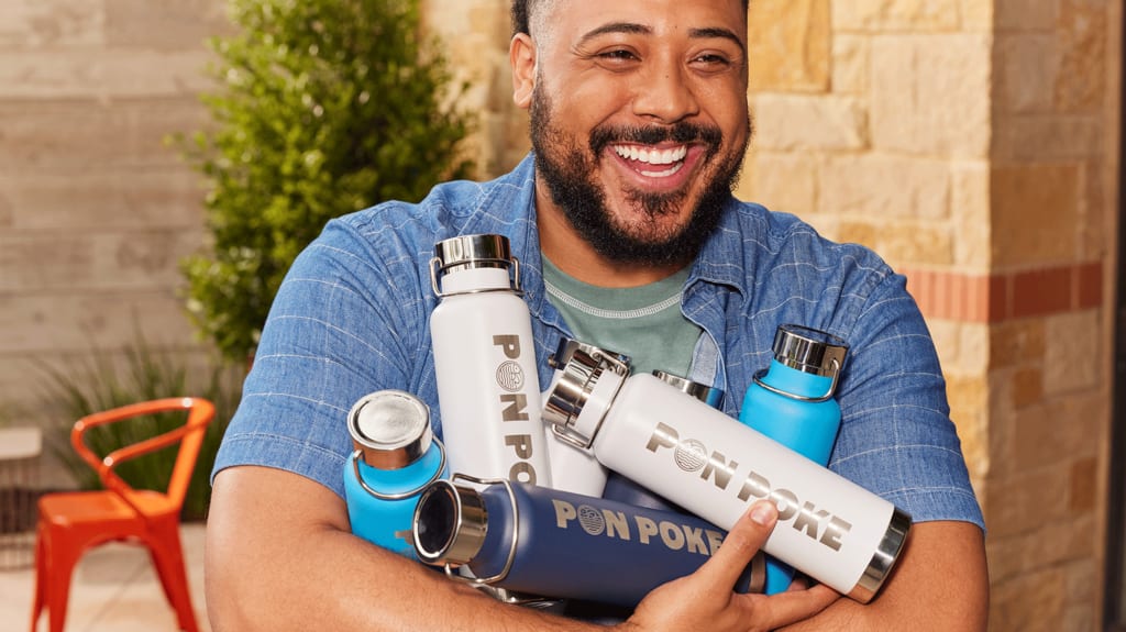man with branded flasks