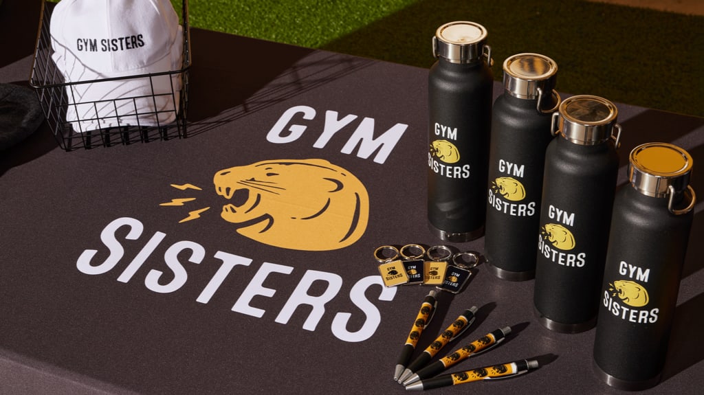 Logo printed on promotional products like water bottles, hats, and pens