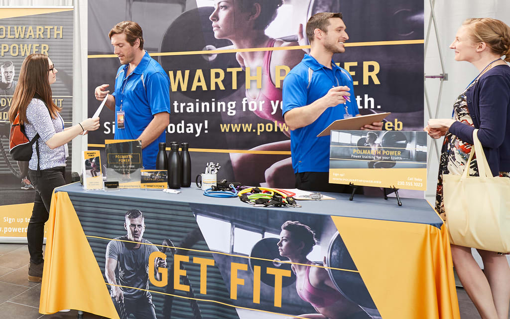 giving away promotional products at a trade event