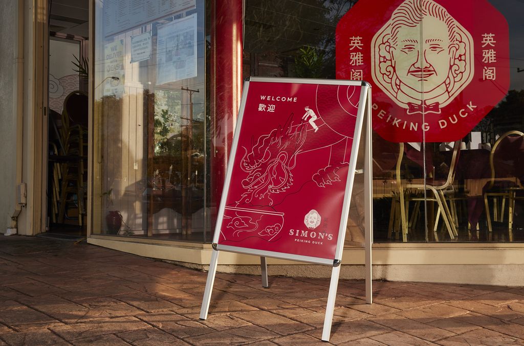 Red A-frame sign for a restaurant