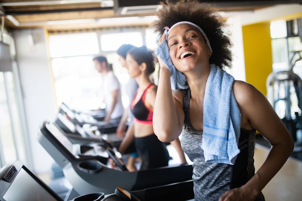 People exercising on treadmills.