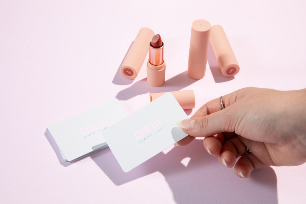 Minimalist typography and pastel business card idea for Dew brand