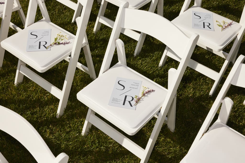 Wedding trends: Wedding logo for programs on chairs