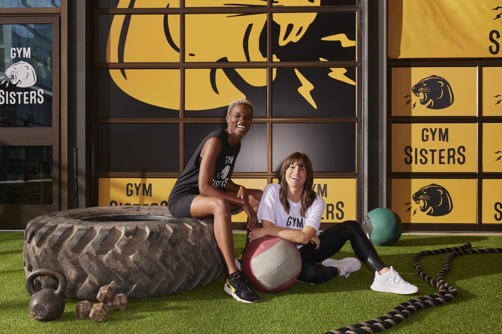 Gym business target audience working out in branded T-shirts.