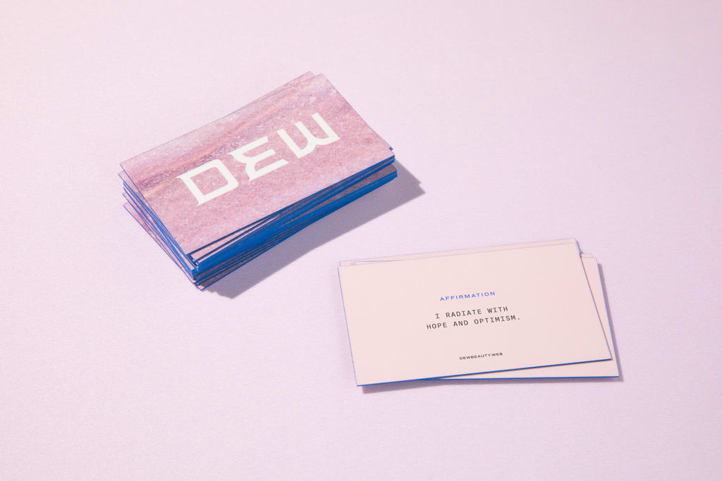 Pink business card as an example of effective use of white space