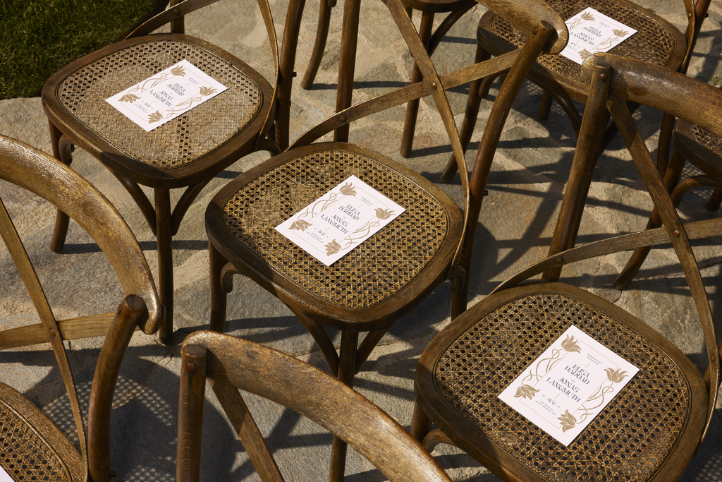 wedding programs on a chair