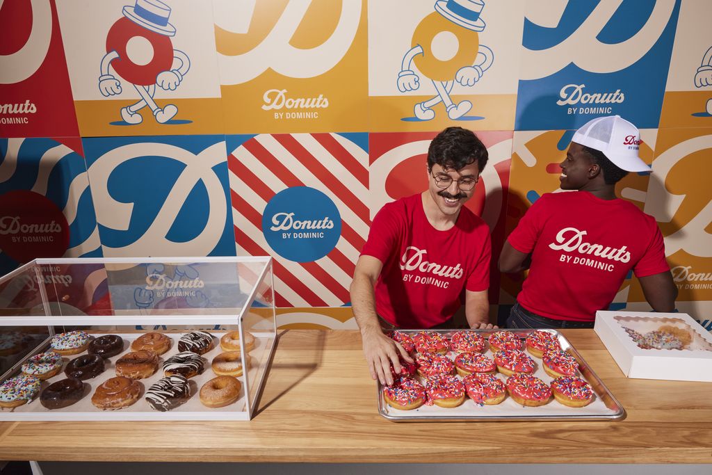 Two men serve Donuts by Dominic