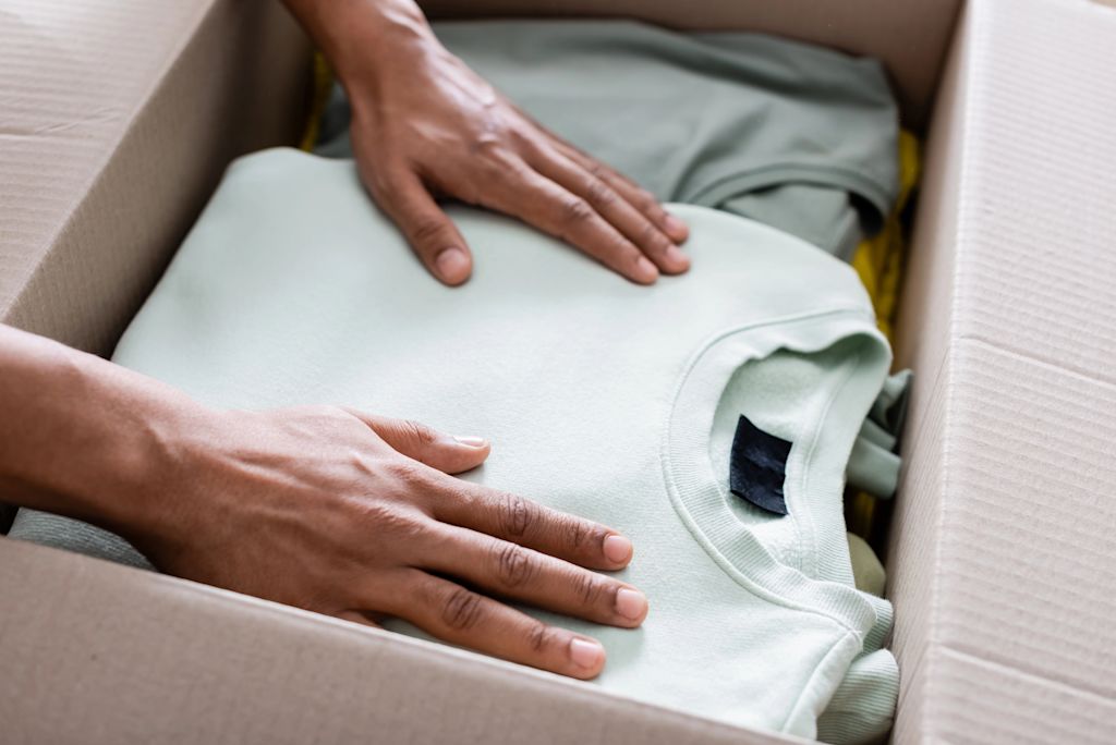 Box of T-shirts.