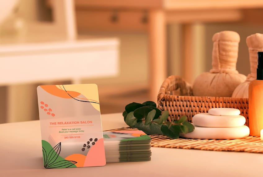 Frosted plastic business card with printed illustrations for The Relaxation Salon