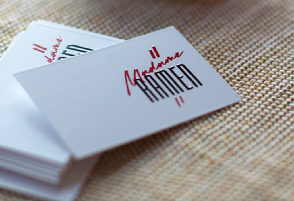 Premium busienss card with heavier weight and embossed gloss for ramen brand