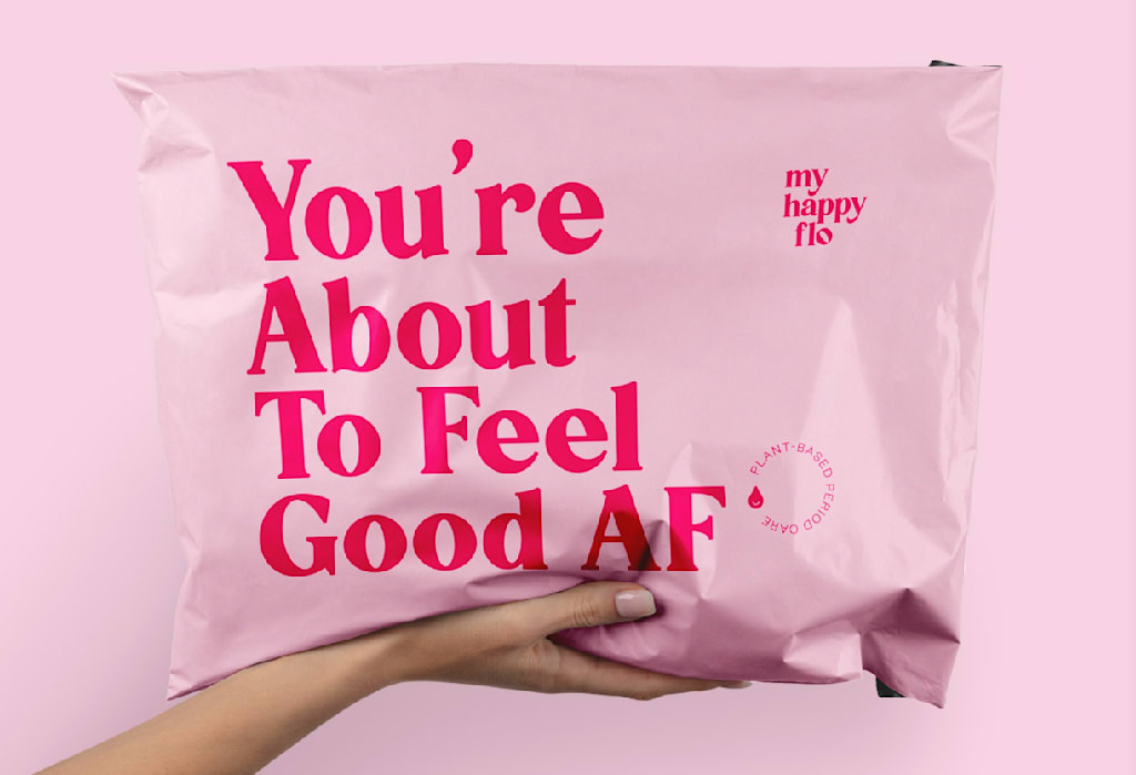 Print marketing materials: pink mailer featuring hot pink text