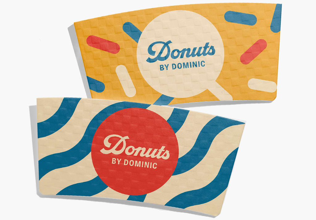 Alliteration in brand names donut company coffee sleeve
