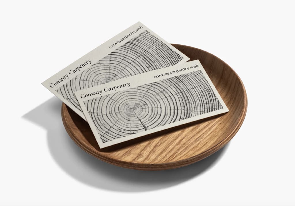 Business card that uses kraft business card paper stock