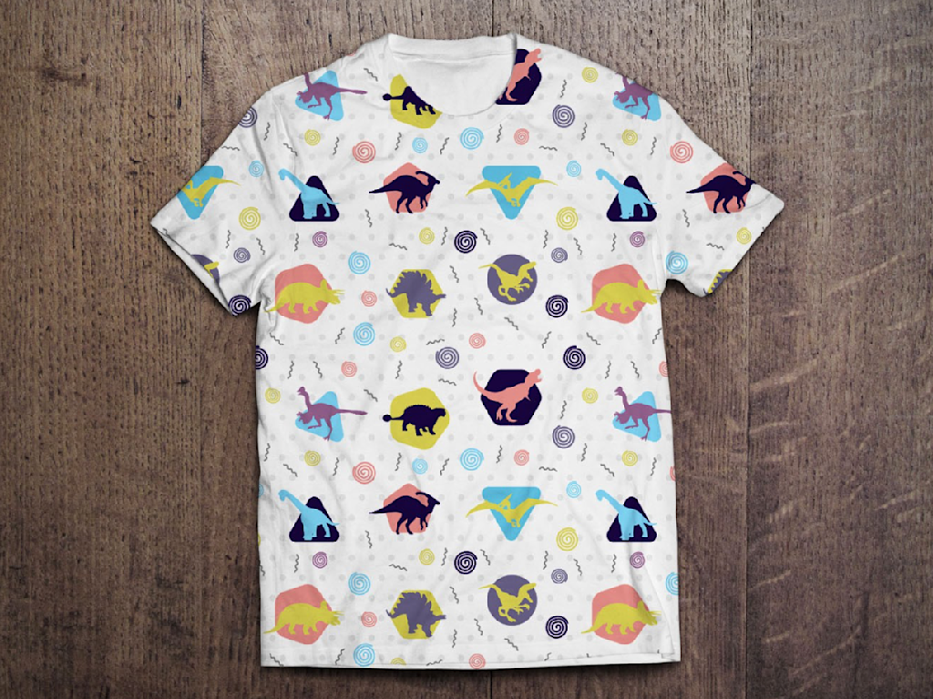 T-shirt design of a colorful all-over dinosaur pattern