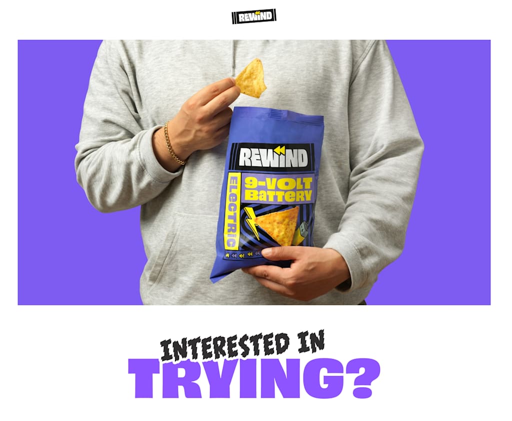 A screenshot of the Rewind landing page promoting their 9-volt battery-flavored chips drop—an example of the Reactive Absurdism digital marketing trend 2026
