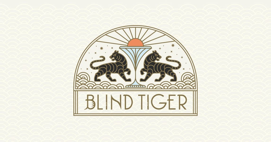 An elaborate logo design in art deco style for Blind Tiger, featuring two tigers and a martini glass