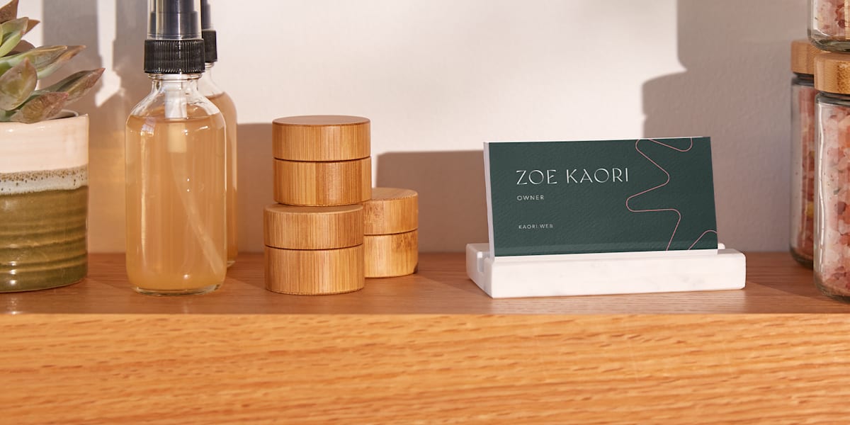 wooden display featuring entrepreneurs business card: an essential tool for marketing