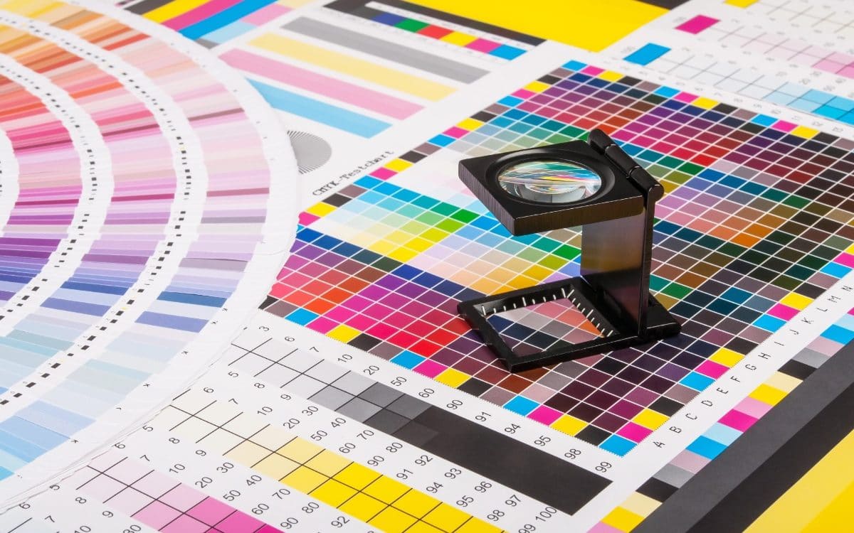 Magnifier on a test print sheet with lots of different colors