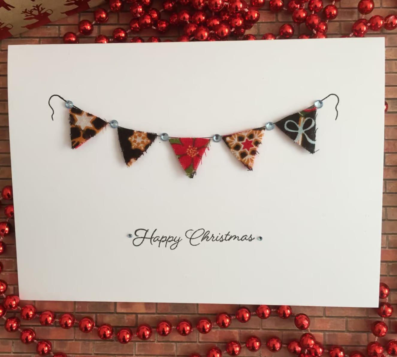 DIY Christmas card design made with fabric scraps