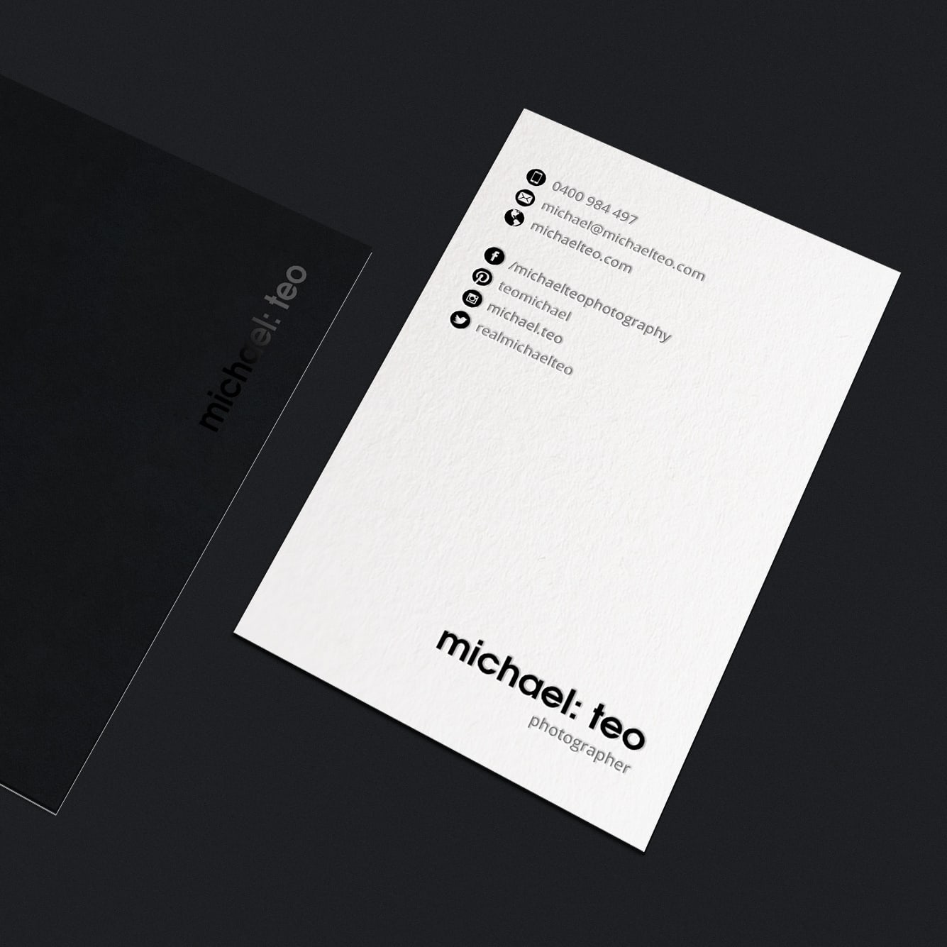 A black and white business card