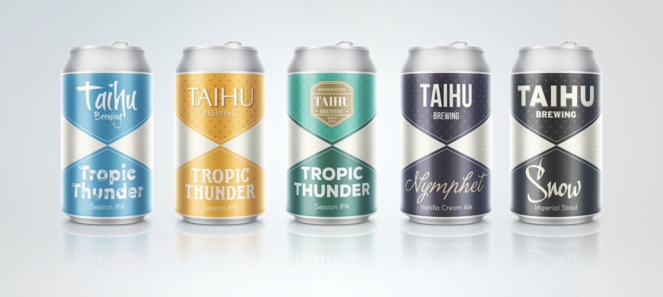 Colorful beer cans with unique branding and logos, showcasing creative beer packaging design.
