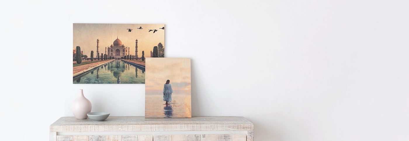 geographical prints adorning fireplace