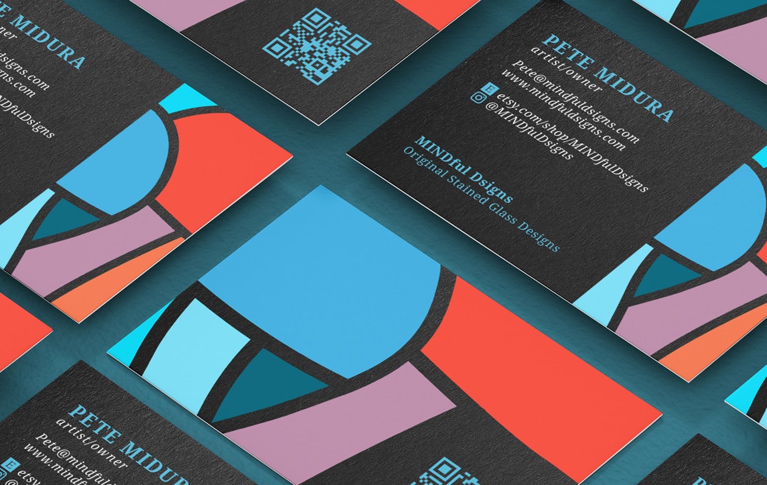 Multicolor business card design with geometrical patterns and shades of burnt orange.