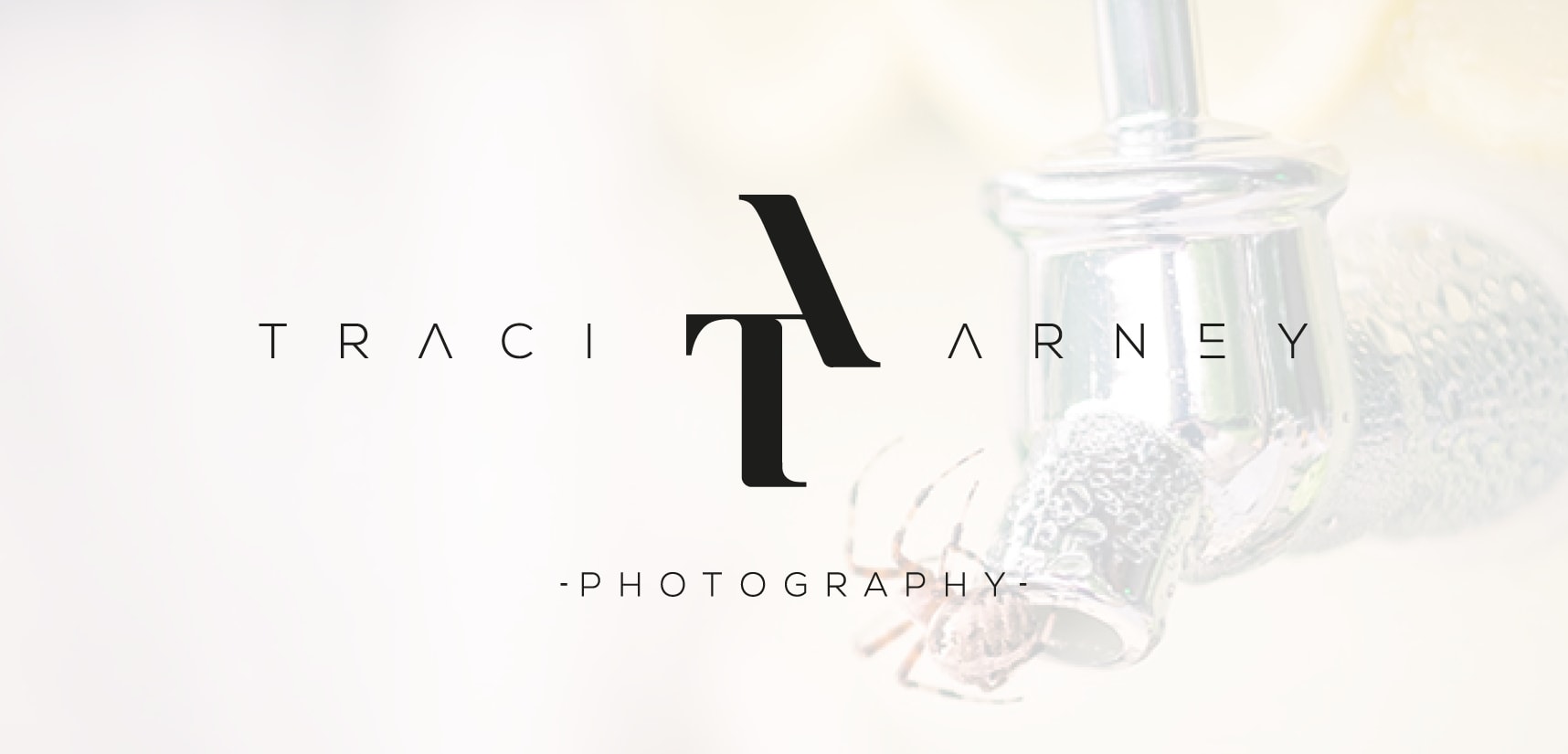 Red and white business card with a large letterform logo