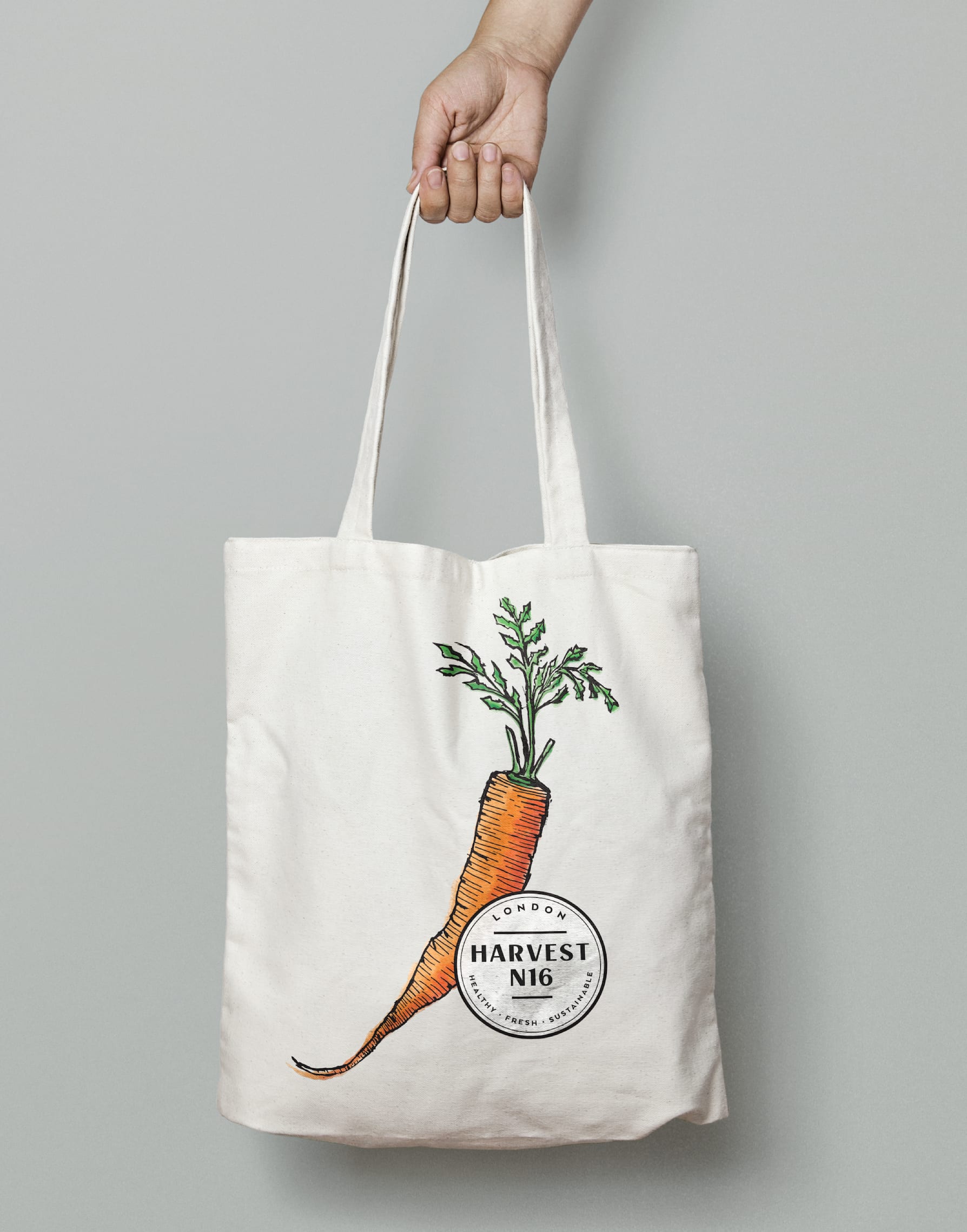 Illustrated tote bag design for a grocer brand