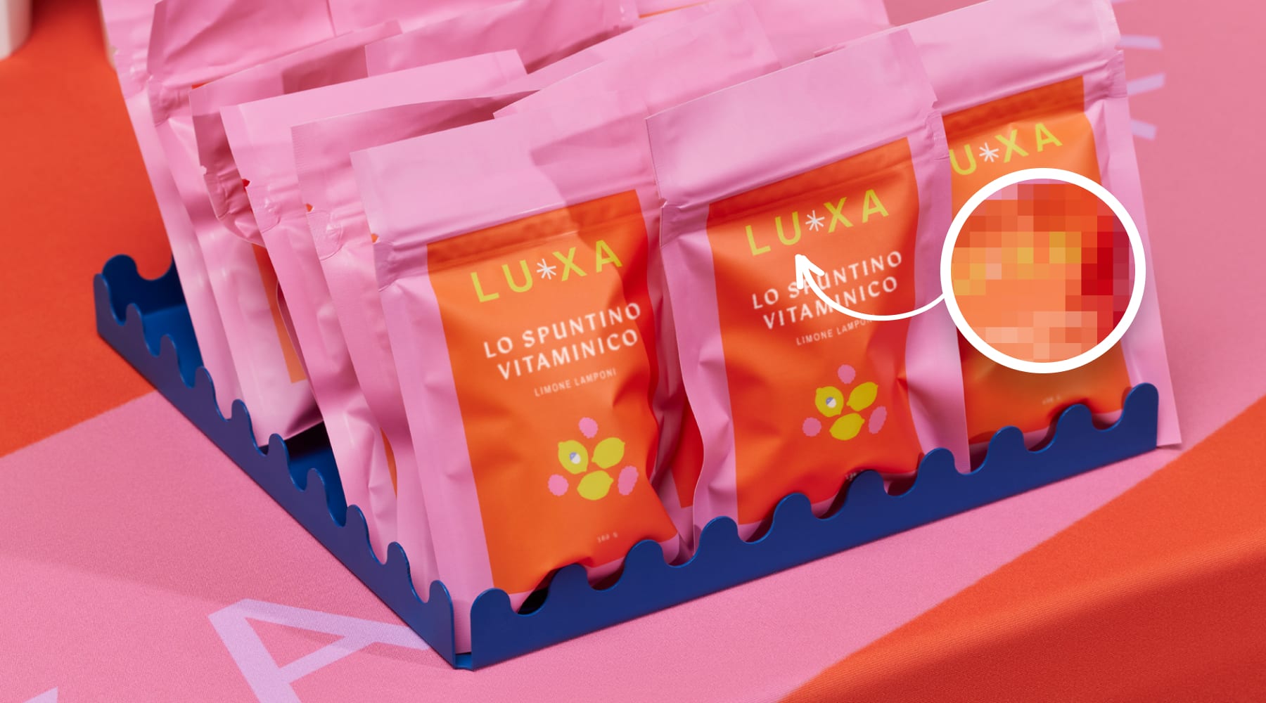 Colorful packaging with zoomed in sample shows pixelated quality of raster images